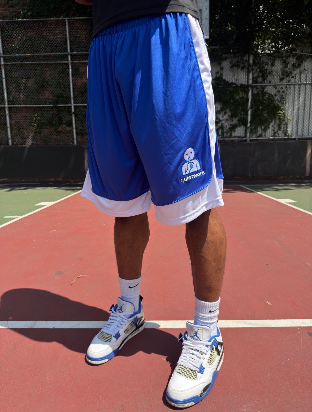 BLUE QUIETWORK HOOP SHORTS